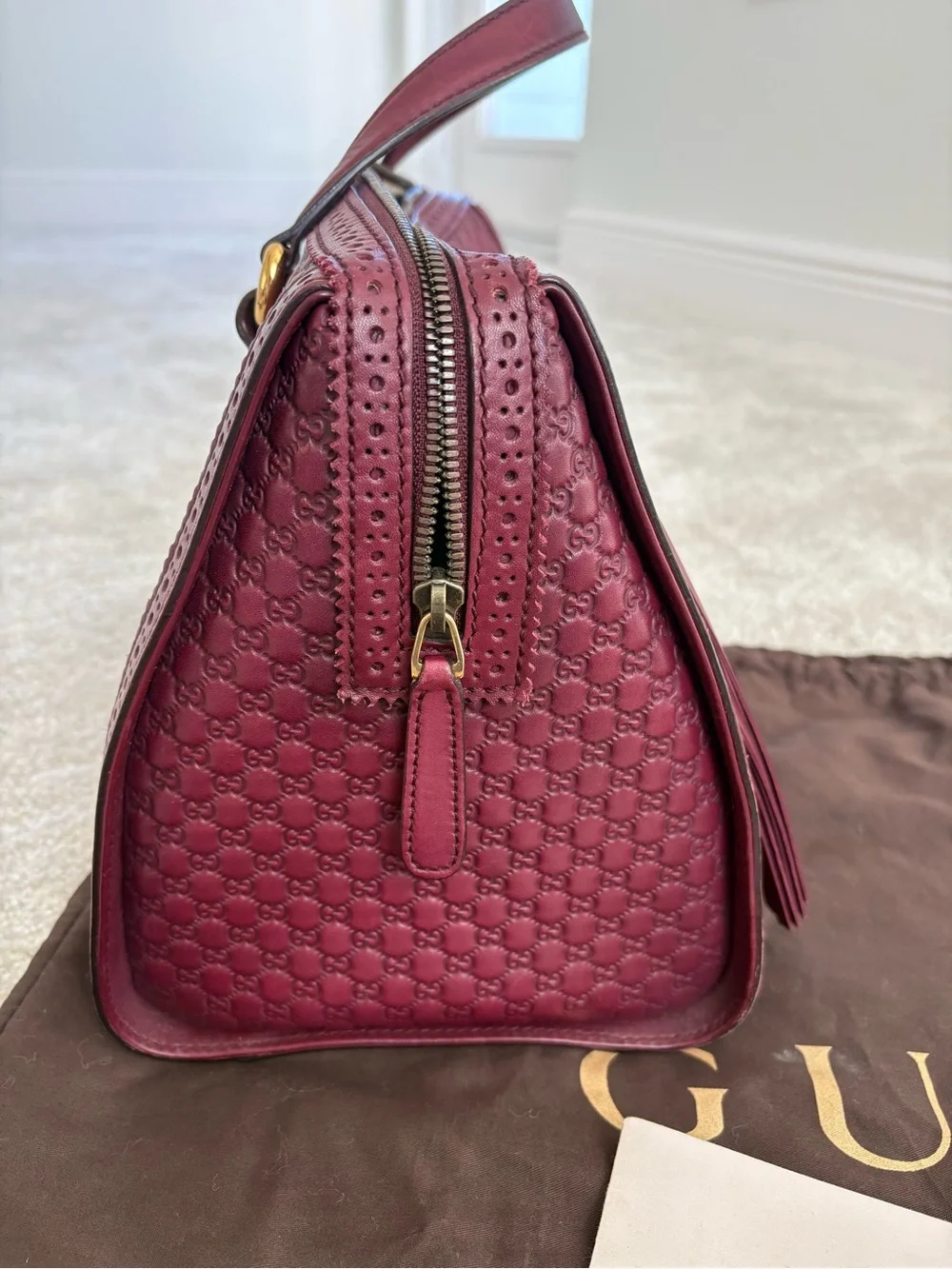 Gucci Burgundy Leather Tassel Satchel with Embossed Monogram